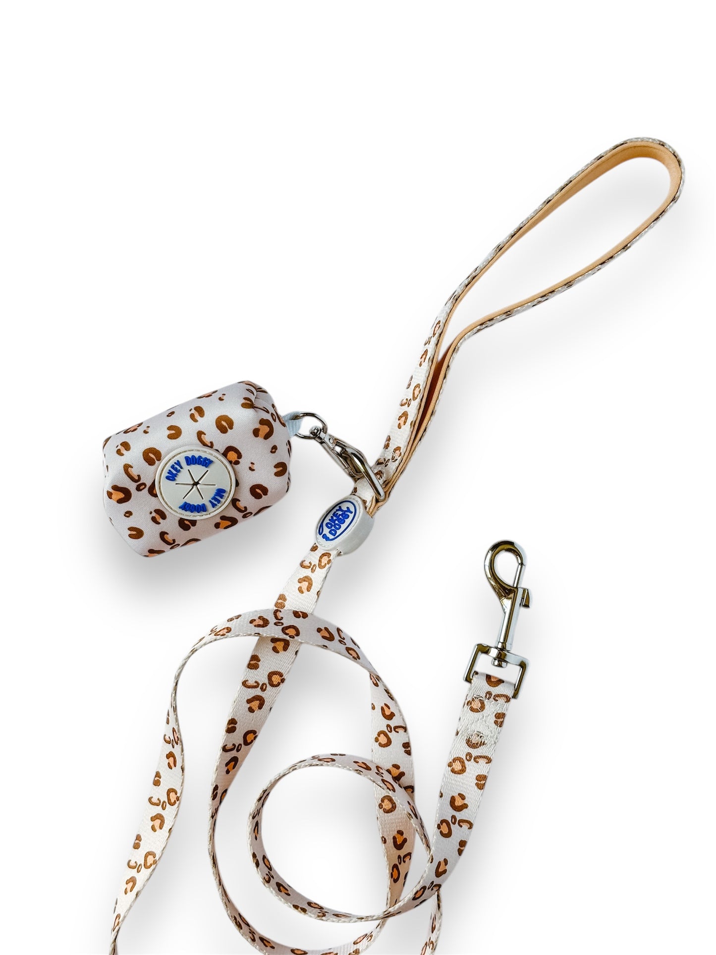 Cute and compact Leopard print poop bag holder for dog walks. Clips easily to any leash or bag. Get yours at Okey-Doggy – fast shipping across Canada!